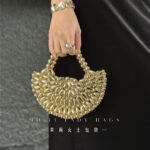 Hand-woven pearl crescent gold bead dumpling handbag